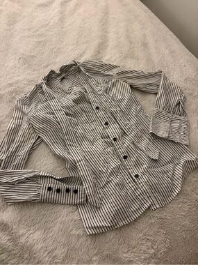 Woman’s Black and White Striped Button-Up Shirt